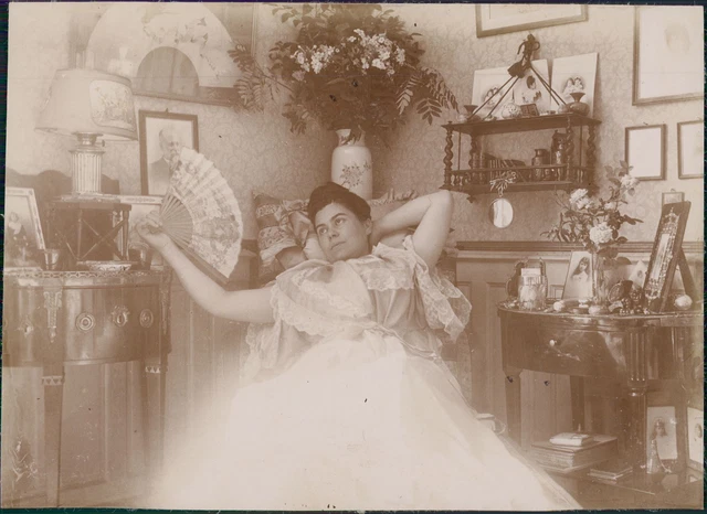 France, woman with fan in her living room, ca.1900, vintage citrate print Vinta
