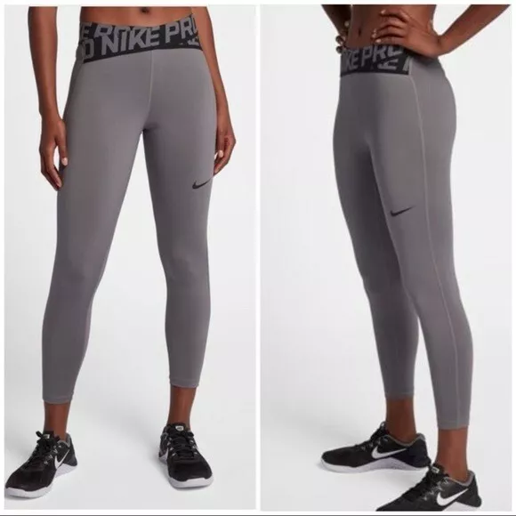 WOMEN'S NIKE PRO dri fit intertwist leggings Small Gray and black