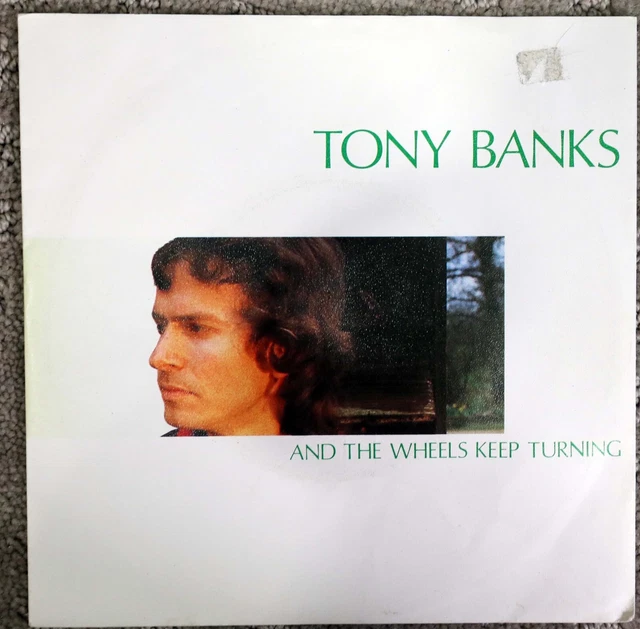 Tony Banks-And the Wheels Keep Turning Charisma Dutch 45 w/PS Genesis solo Tony Banks-And the Wheels Keep Turning Charisma Dutch 45 w/PS Genesis solo