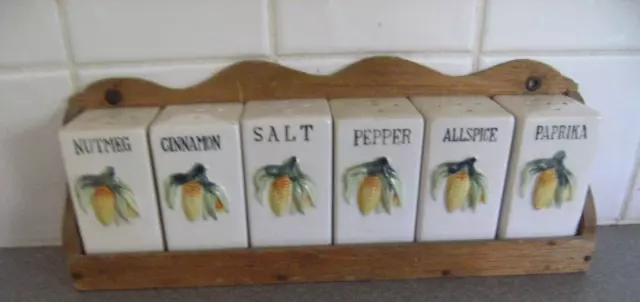 Vintage Ceramic Spice Canisters In Wooden Rack