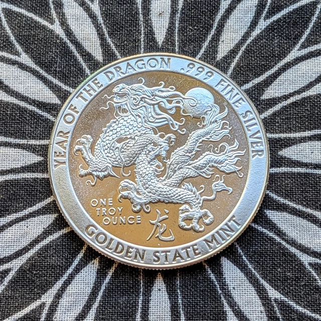 GSM - YEAR of the DRAGON 1 oz .999 FINE SILVER BU ROUND $83.99