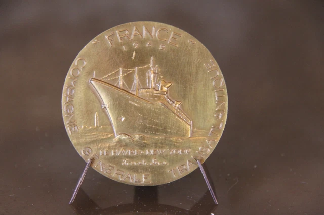Médaille Du PAQUEBOT LIBERTE - Bronze 50 Mm Haut Relief Grav Jean Vernon Femme Buste Nu Debout Dans Une Coquille Soutenue Par 1