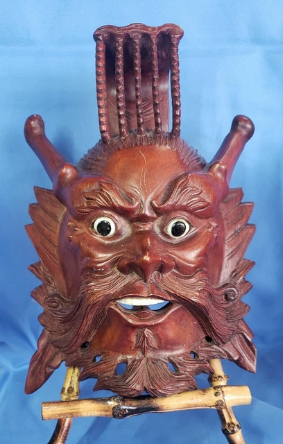 antique Naga wood carved demon face mask