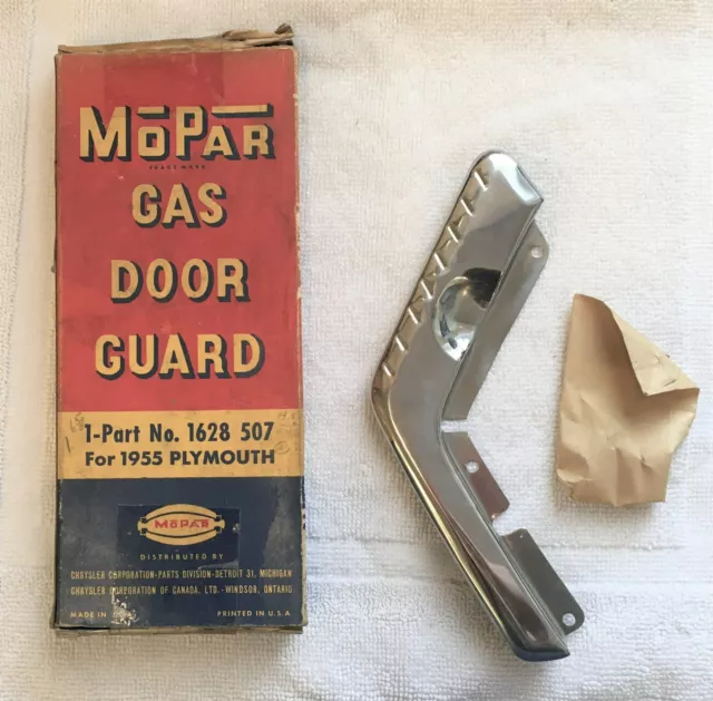 NOS 1955 Plymouth Savoy Belvedere Plaza gas door guard w Mopar box and fasteners