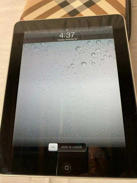 Apple iPad Model A1219 16GB Silver bundled with an authentic Burberry Cover