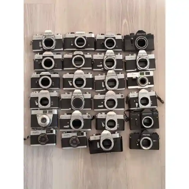Lote de 24 cámaras sin probar de colección - piezas/reparación Minolta Yashica Petri Praktica