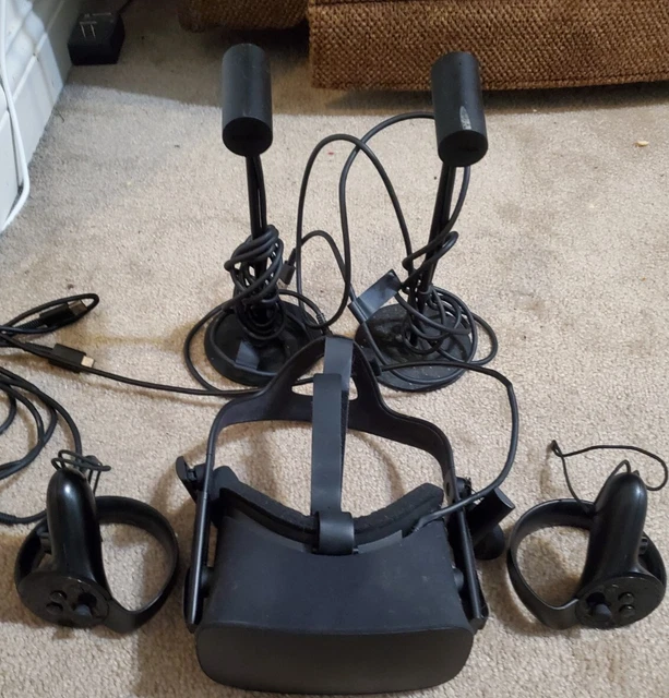 Meta Oculus Quest VR Headset With Two Sensors and Controllers