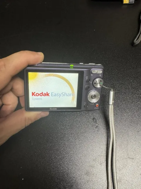 Cámara digital Kodak Easy Share M893 IS 8,1 MP - púrpura funciona
