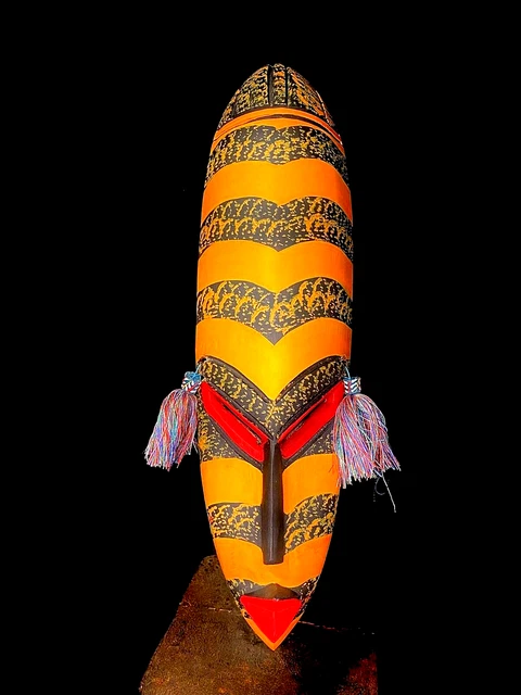 special handmade traditional African mask made of wood in striped orange-6115