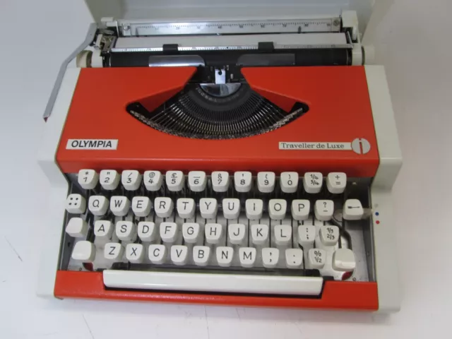 Olympia Traveller  De Luxe  Portable Typewriter Orange  In Case