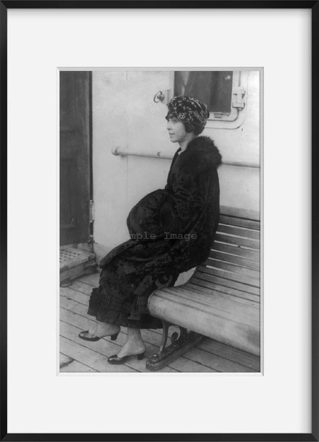 Photo: Hélène Dutrieu, 1877-1961, cycling world champion, aviator, seated on shi