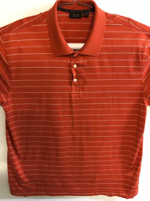 Greg NormanTasso Elba 5 Iron; Orange w/White Stripe Polo Golf Shirt. Size L.