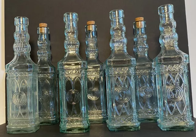 Antique Glass Bottle Lot Of 7 Made in Spain Olive Oil Raised Design Green Hue