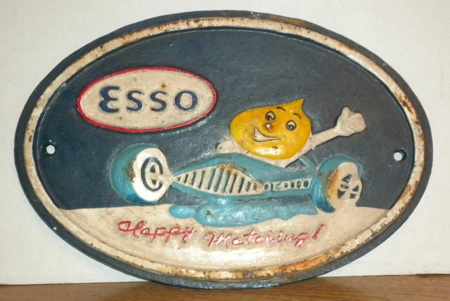 old cast iron esso happy motoring sign multi color esso boy primitive