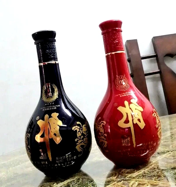 Add a touch of Asian elegance to your home with these two empty porcelain liquor