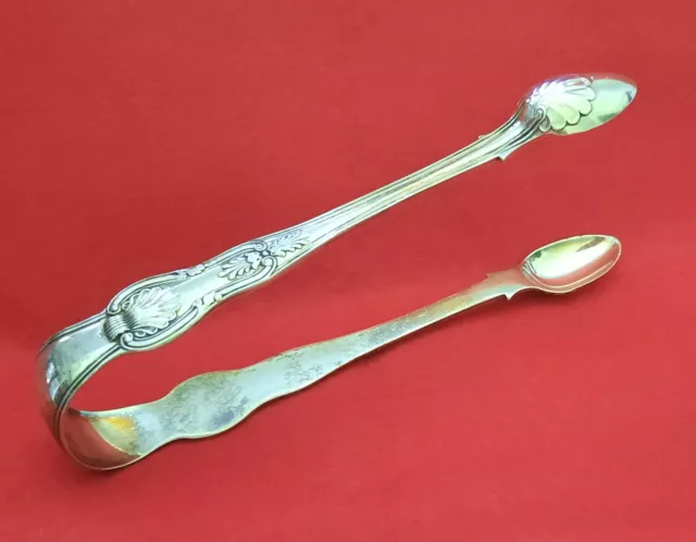 William IV silver sugar tongs.