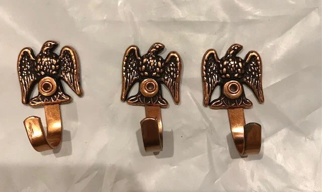 Small vintage eagle-shaped wall hooks, copper colored, set of 3