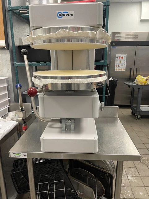 Make Perfect Pizzas with the Easy-to-Use Univex Pizza Spinner! New condition.