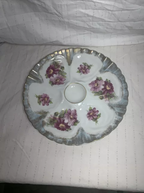 Floral pattern Oyster  Plate trimmed in blue and gold Marked Limoges France