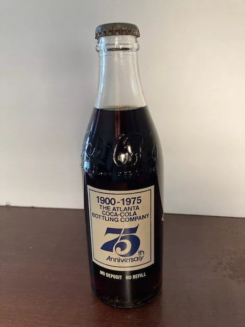 The Atlanta Coca Cola Bottling Company 75th Anniversary Bottle Full w/ Cap 1975
