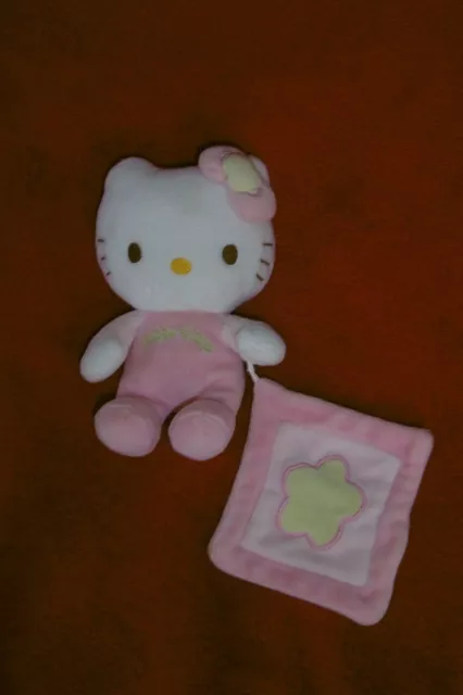 Doudou Peluche Grelot Hello Kitty Chat Rose et Blanc Mouchoir Fleur Verte Sanrio