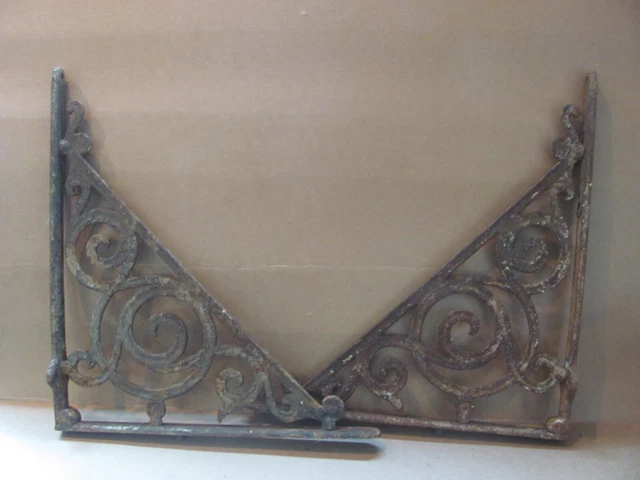 Pair of Large Antique Victorian Cast Iron Brackets from Maine.
