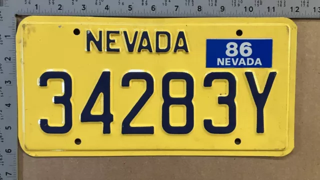1986 Nevada mileage tax license plate 34283 Y trucking permit 15384