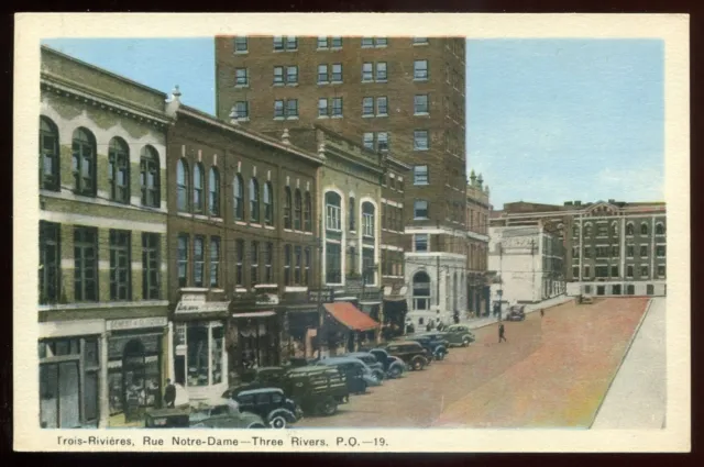 TROIS RIVIERES Quebec Postcard 1930s Rue Notre Dame. Stores Old Cars