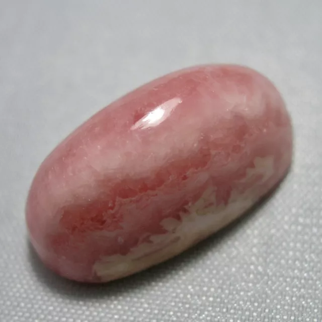 Echter Rhodochrosit Oval Cabochon 30.8ct 22.2x11.4mm