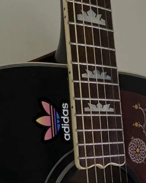 Noel gallagher deals adidas sticker