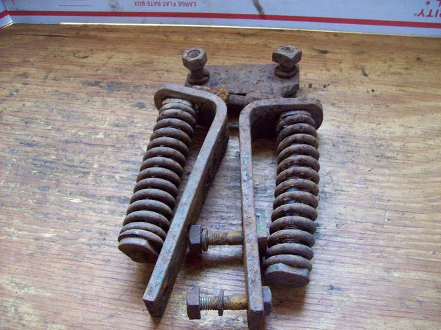 Farmall Cub International moldboard plow right plow mounting bracket and springs
