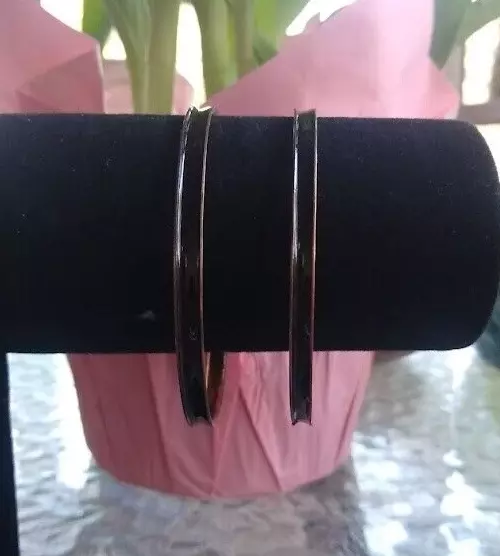 Two Black Enameled Brass Bangle Bracelets