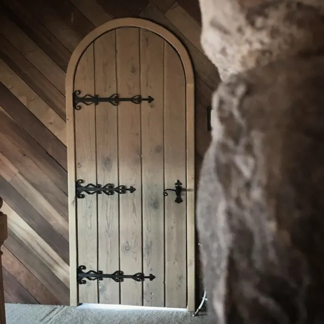Rustic reclaimed lumber arch door solid plank wood wine cellar castle iron