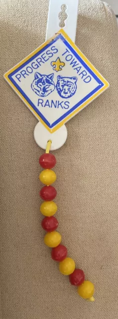 Vintage 80s BSA Cub Scout Progress toward ranks totem 5 yellow & 5 Red beeds