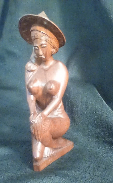 Solid wood, Indonesian, Balinese woman, wooden statue. 9x4x3 inches.