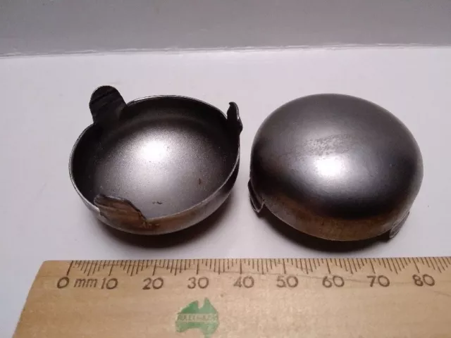 2 old metal hub caps to suit pram or pedal car or large toy aprox 40mm across