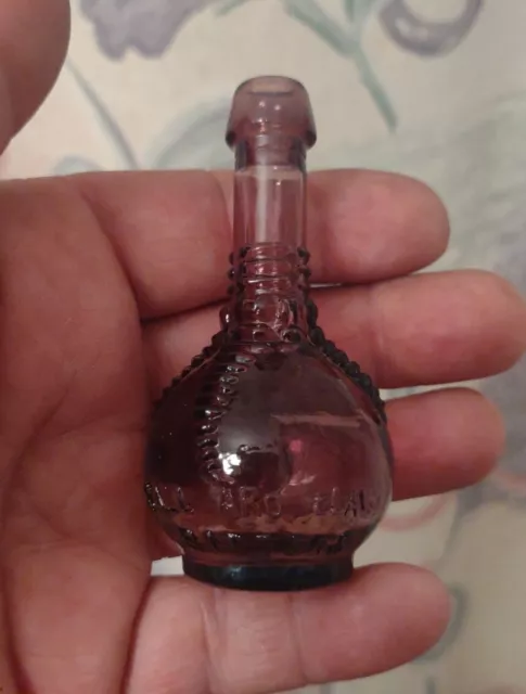 Vintage Ball and Claw Bitters Miniature Purple Glass Bottle 3.25" Taiwan Used