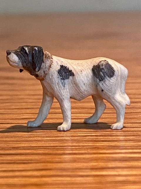 Vintage hand Carved bovine Bone dog miniature nice!