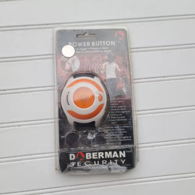Doberman Security A Jogger’s Personal Alarm and Watchdog Hit Power Button AS IS