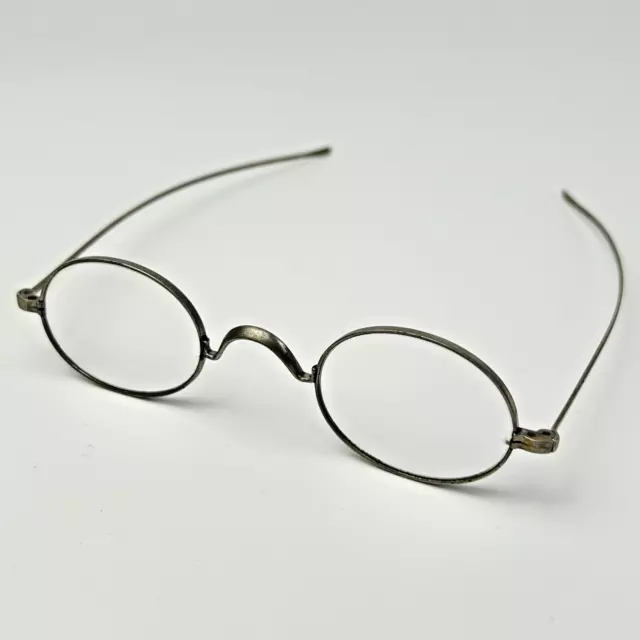 Vintage AO American Optical Eyeglasses from 1889-1910 oval wire rim silver tone
