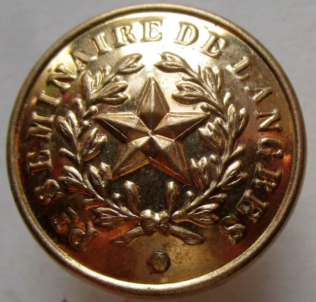 Bouton bombé en métal doré : Pt SEMINAIRE DE LANGRES, à l'étoile de 23 mm