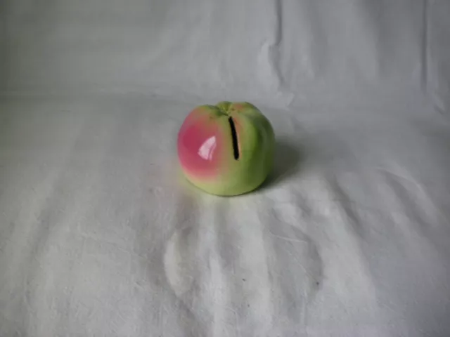 Tirelire à casser en barbotine en forme de pomme