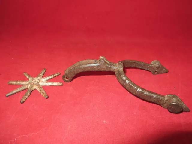 Spanish Colonial single spur & 8 point 3" rowel.