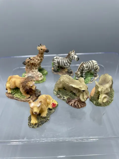 7 Piece Set Miniature ￼Resin Figure 2 Elephants 2 Zebras 2 Giraffes 2 Lions ￼ ￼
