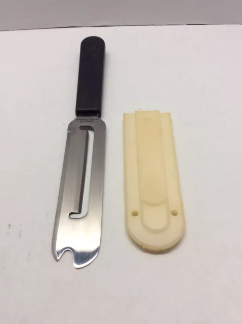 https://www.picclickimg.com/1Y8AAOSw0c1k~2fA/Pampered-Chef-Cheese-Knife-1125-With-Plastic-Sheath.webp