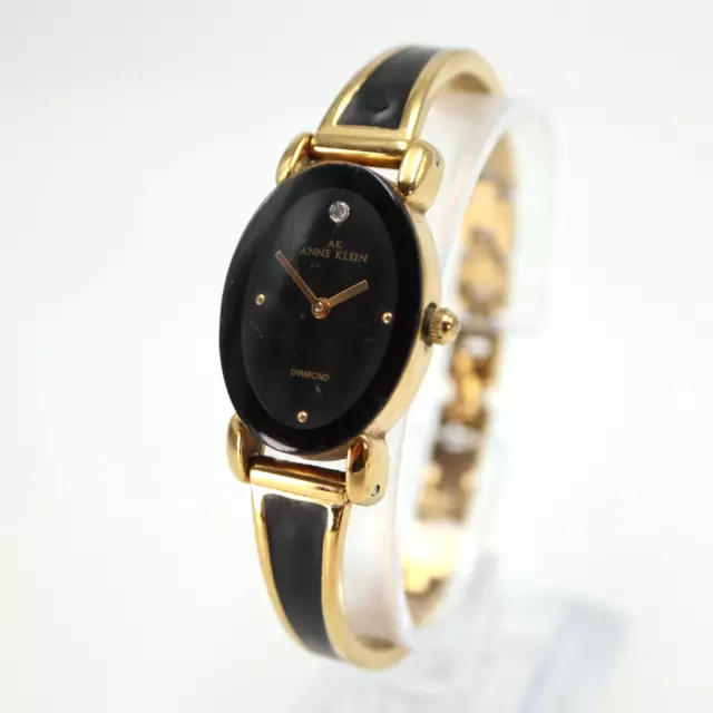 Womens Anne Klein Watch Diamond 21mm Oval Black Dial Gold Tone Bracelet 10/8286