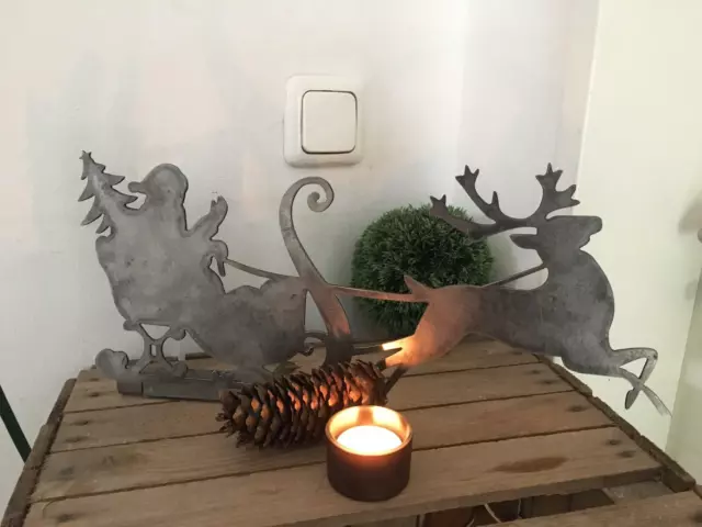 Winterdeko Weihnachtsmann Schlitten Geschenk Edelrost