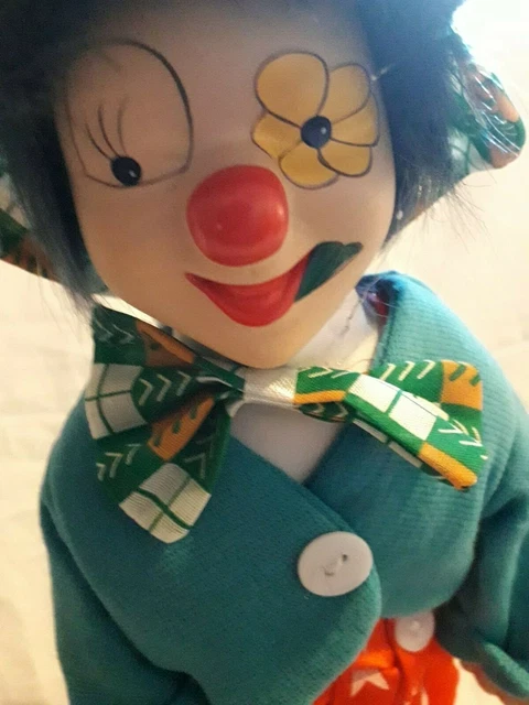 Wind up musical hot sale porcelain clown doll