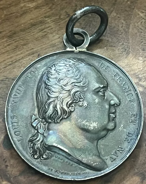 LOUIS XVIII . MÉDAILLE d’HONNEUR POUR SAUVETAGE . 1824 .(ARGENT) . (Voir photos)