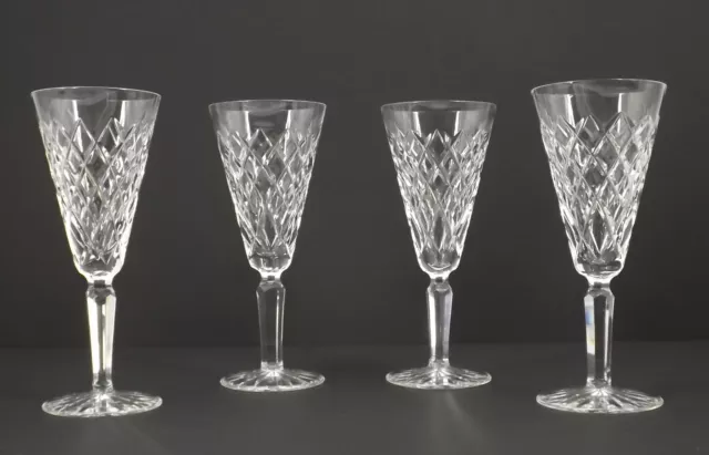 A Set of 4 WATERFORD Crystal - TYRONE cut - Champagne Flutes Glasses